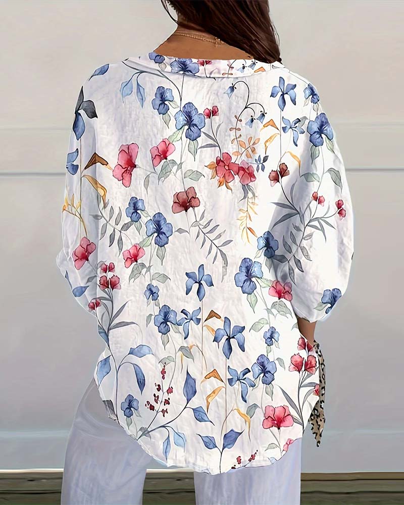 Blusa con stampa floreale botanica