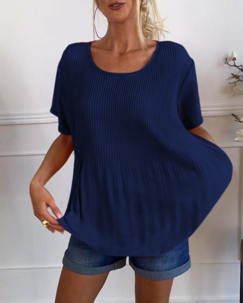 Blusa plissettata a tinta unita con scollo tondo