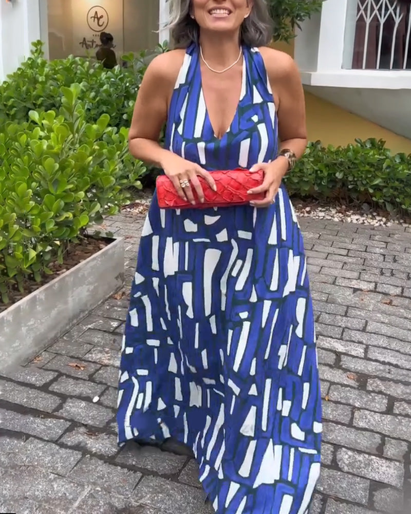 Elegantes Kleid mit V-Ausschnitt und geometrischem Print