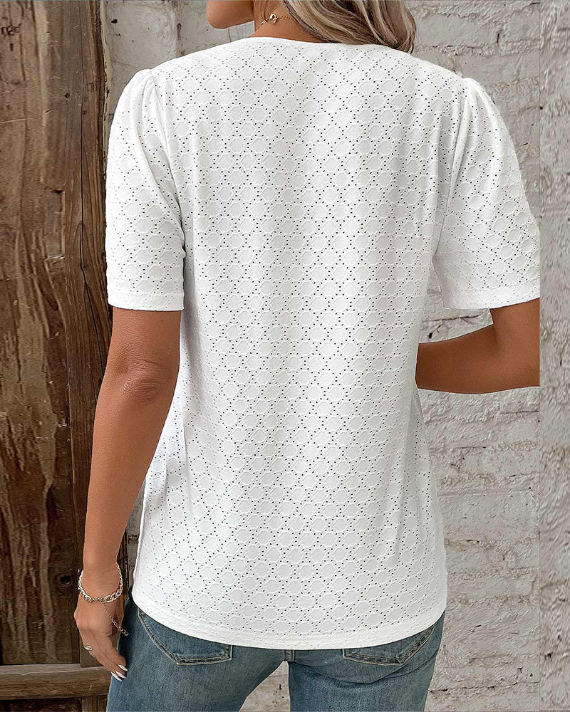 Top tinta unita con maniche a palloncino