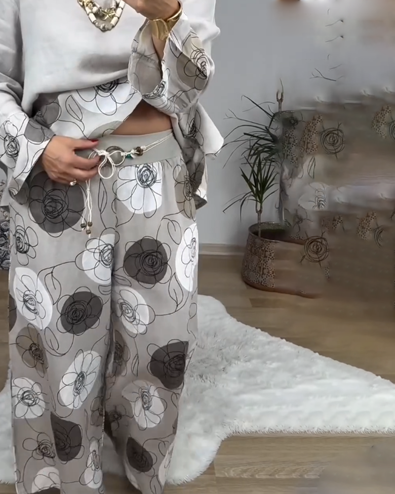 Completo con pantaloni a gamba larga e stampa Fashion Positioning