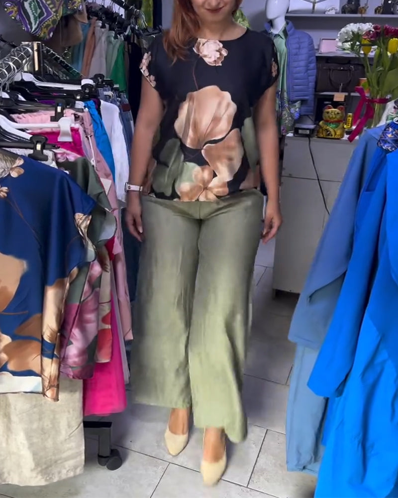 Camicetta a maniche corte con stampa floreale e scollo tondo