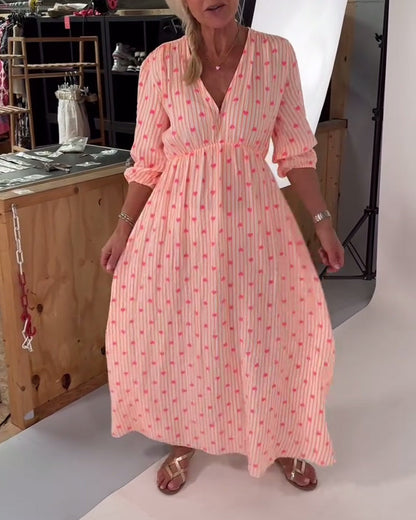 Elegantes Kleid mit V-Ausschnitt und Herz-Print
