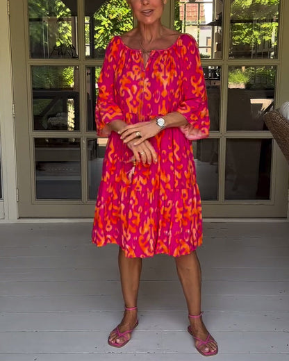 Lockeres Kleid mit Glockenärmeln und Print