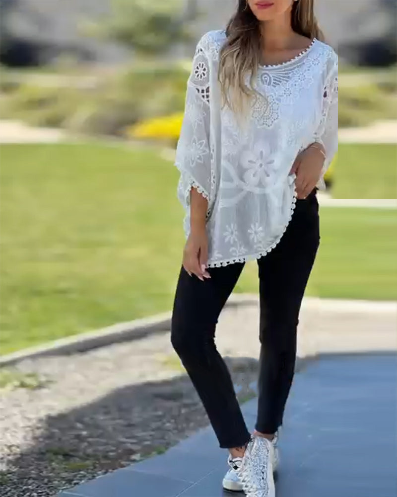 Bluse mit Spitzeneinsatz und Fledermausärmeln