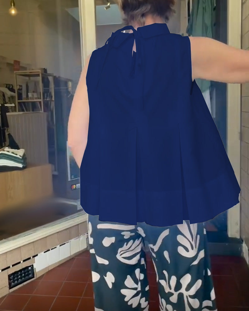 Blusa semplice senza maniche in tinta unita