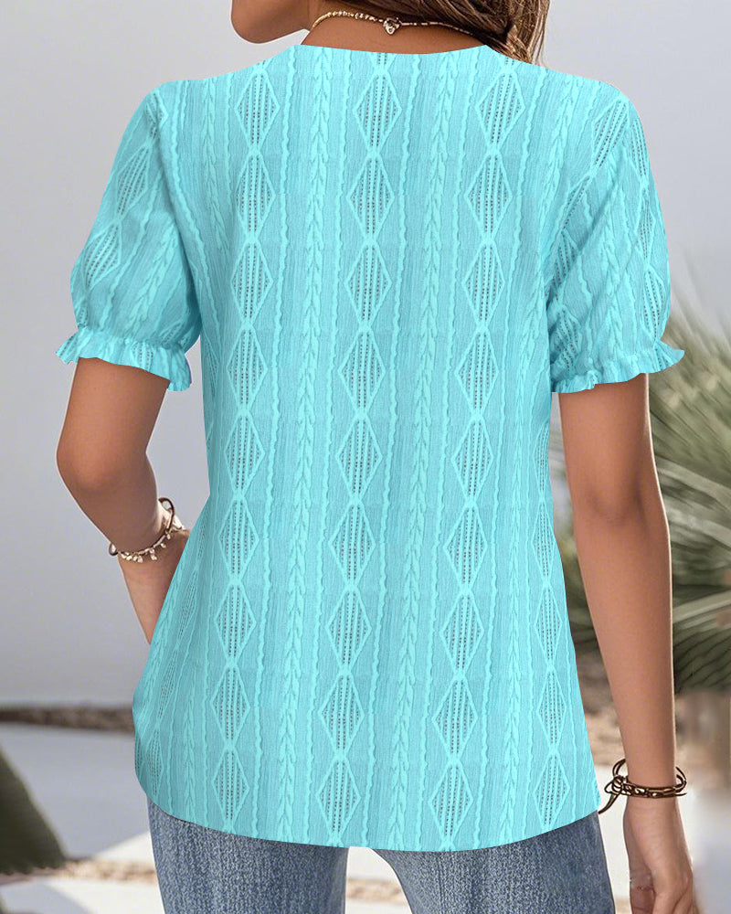 Camicetta a maniche corte in pizzo cavo con scollo a V e tinta unita