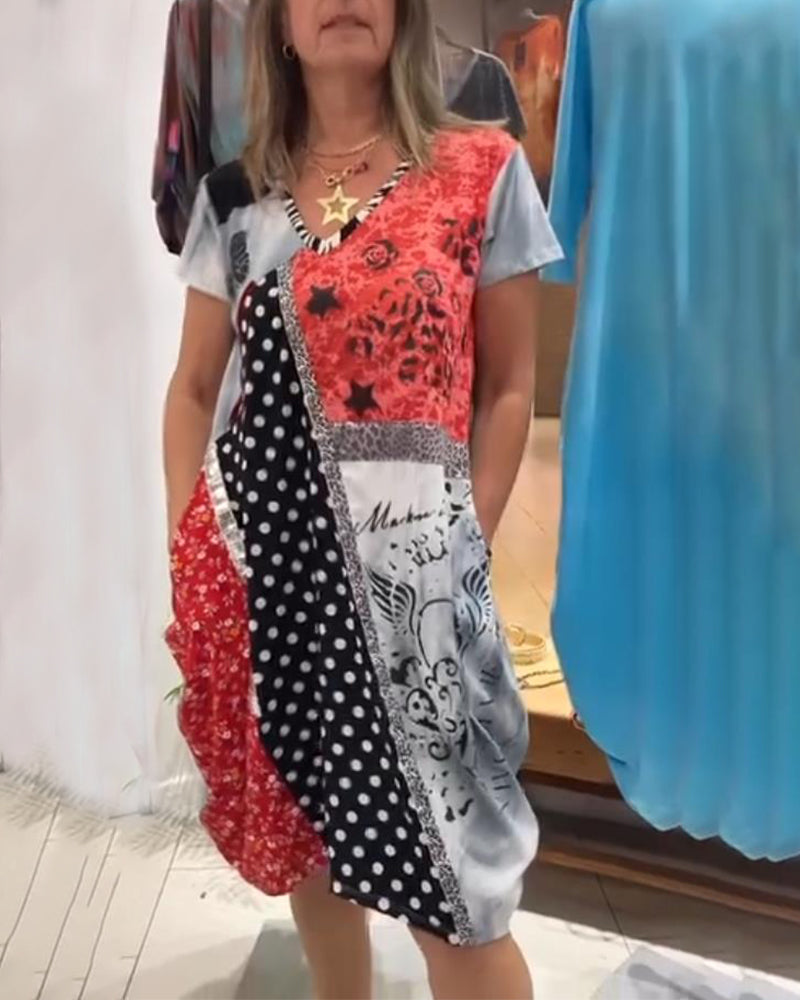 Abito con tasca a contrasto e pois stampati