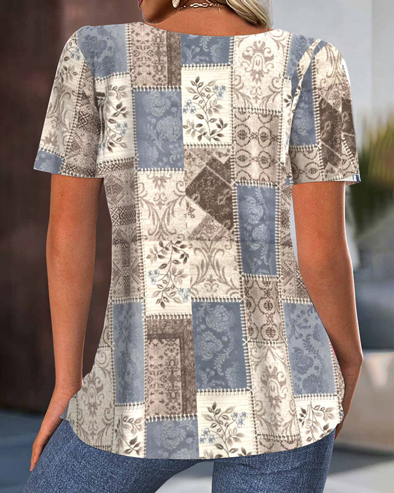 Vintage Bluse mit Rundhalsausschnitt und Plissierung und Print