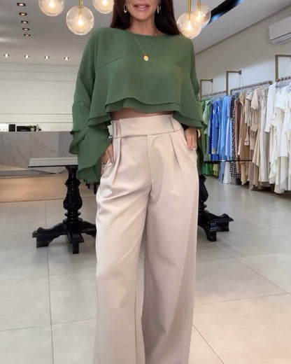 Blusa con doppia manica a sbuffo