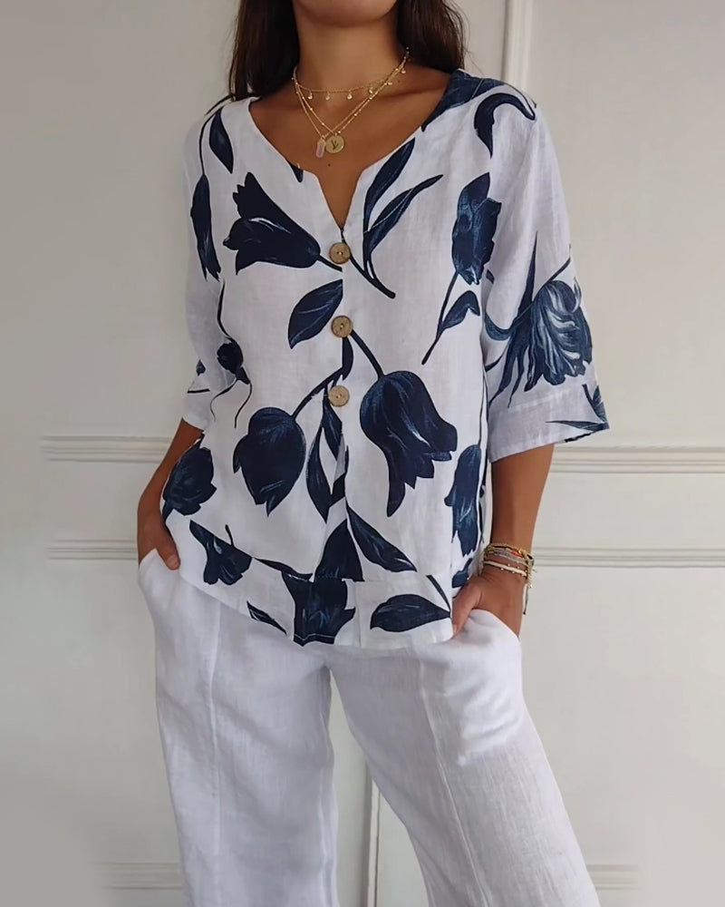 Top con bottoni in cotone e lino con stampa floreale