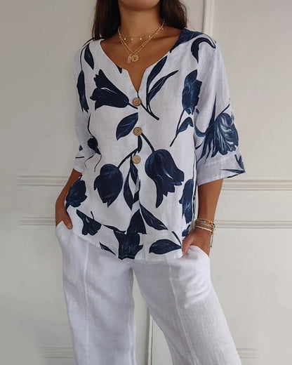 Top con bottoni in cotone e lino con stampa floreale