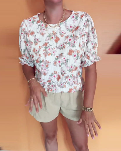 Bluse mit Rundhalsausschnitt und Blumenmuster, kurzärmlig