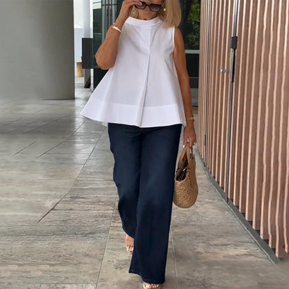 Blusa semplice senza maniche in tinta unita