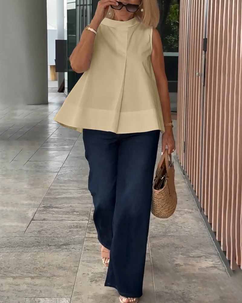 Blusa semplice senza maniche in tinta unita