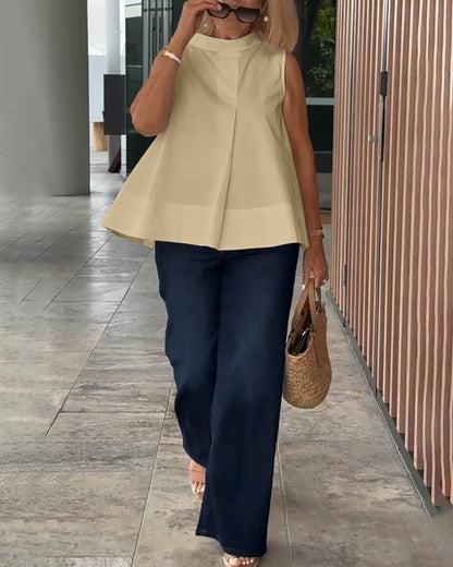 Blusa semplice senza maniche in tinta unita