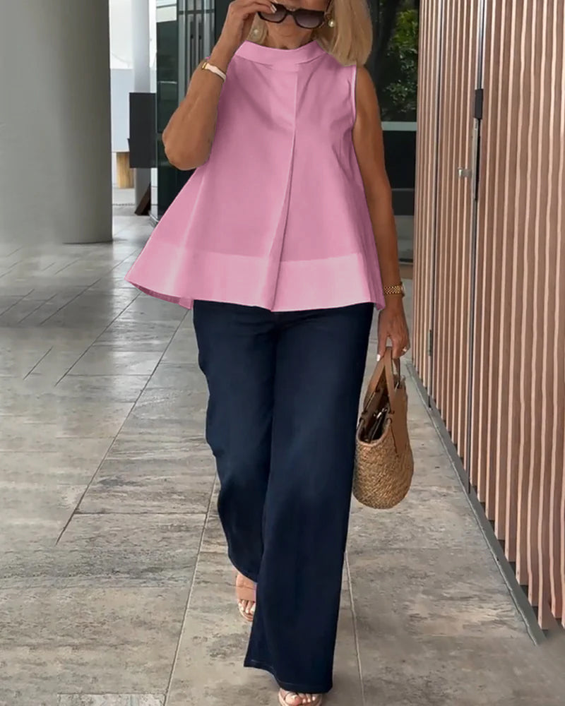 Blusa semplice senza maniche in tinta unita