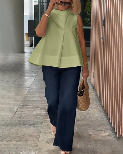 Blusa semplice senza maniche in tinta unita