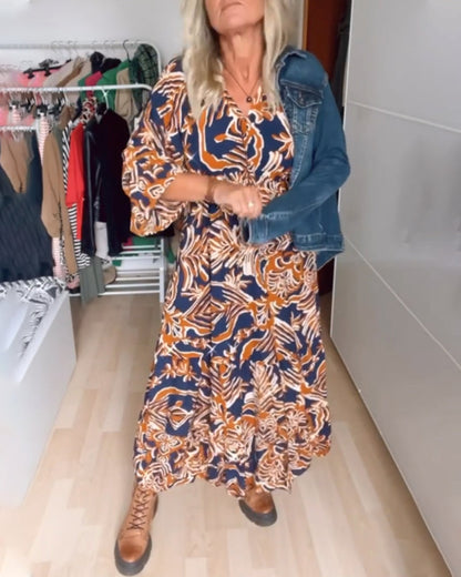 Vestido maxi estampado com decote em V