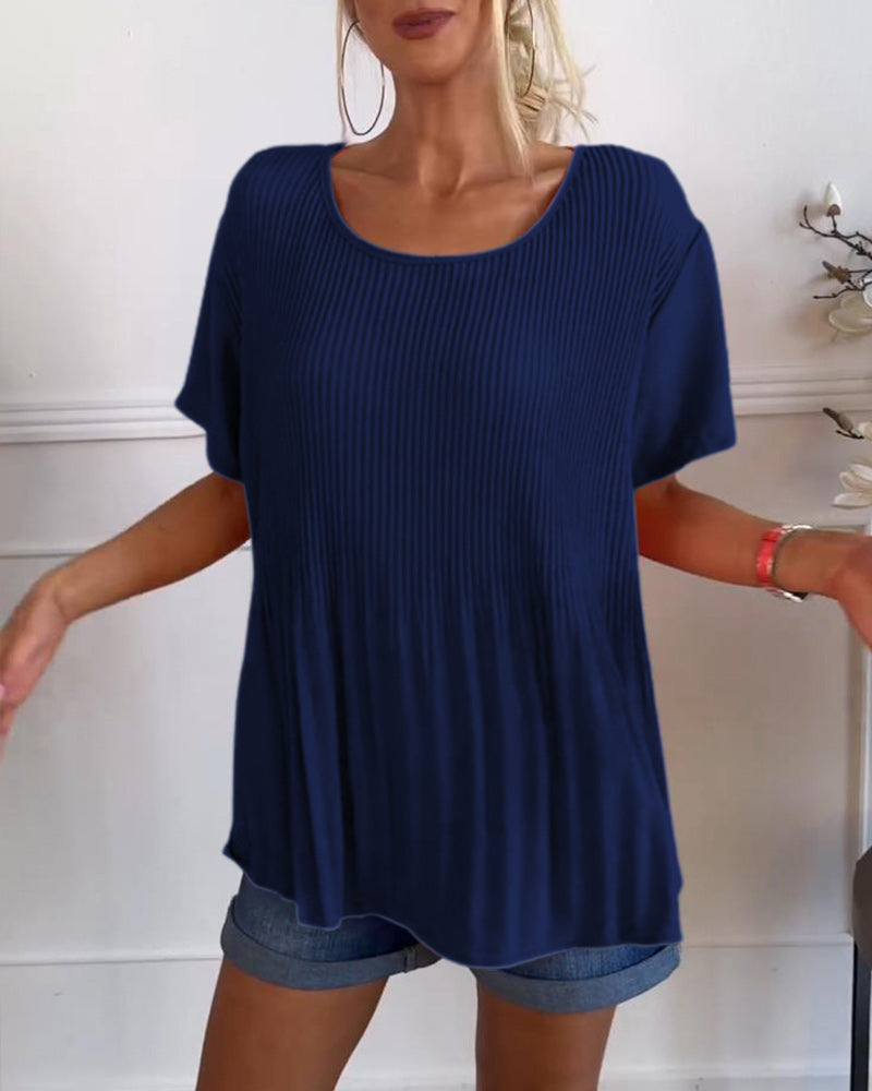 Blusa plissettata a tinta unita con scollo tondo