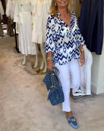 Camicetta stampata con maniche a lanterna e lacci alla moda