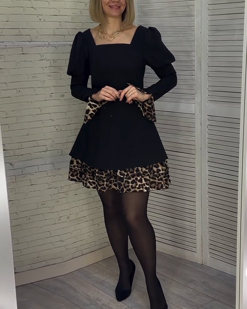 Elegantes Kleid mit Puffärmeln und Leopardenmuster