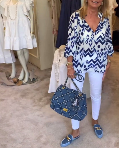 Camicetta stampata con maniche a lanterna e lacci alla moda