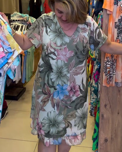 Kleid mit V-Ausschnitt und kurzen Ärmeln und Blumenmuster