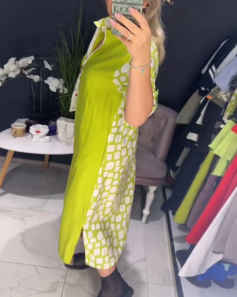 Kleid mit halbem Reißverschluss und unregelmäßigem Schlitz