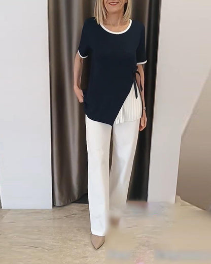 Bluse mit Rundhalsausschnitt und Kontrastfalten