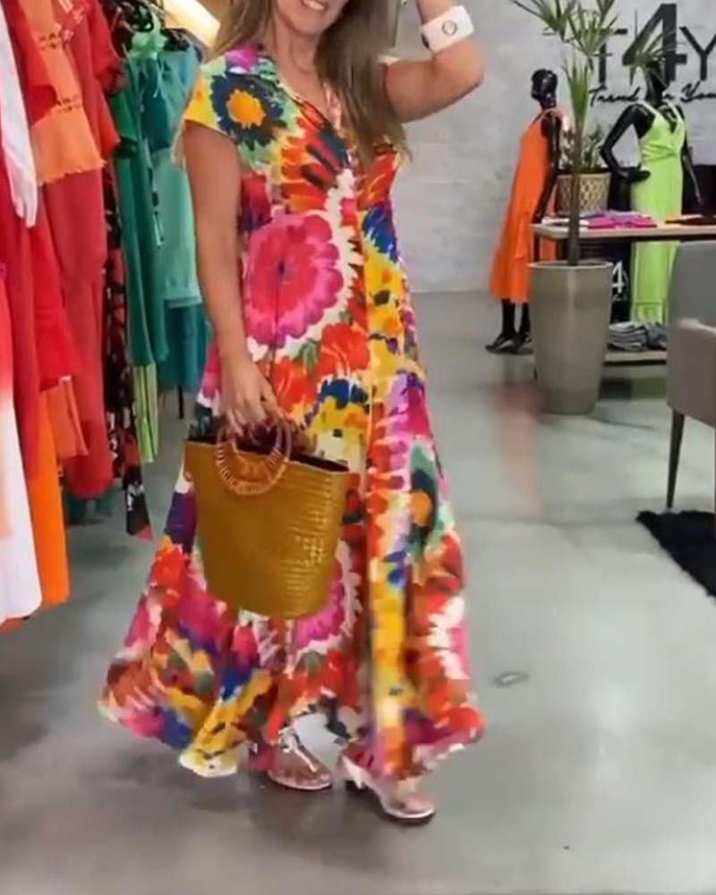 Buntes Kleid mit Taschen und Blumenmuster