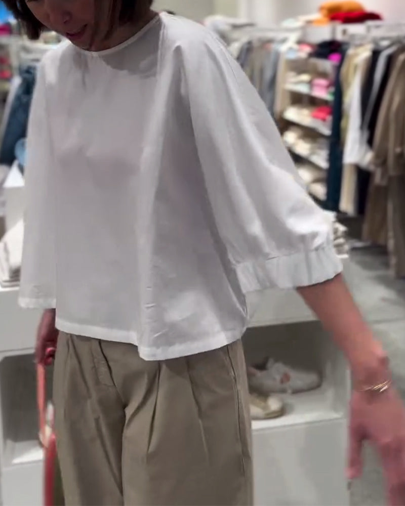 Lockere Bluse mit Fledermausärmeln in Volltonfarbe