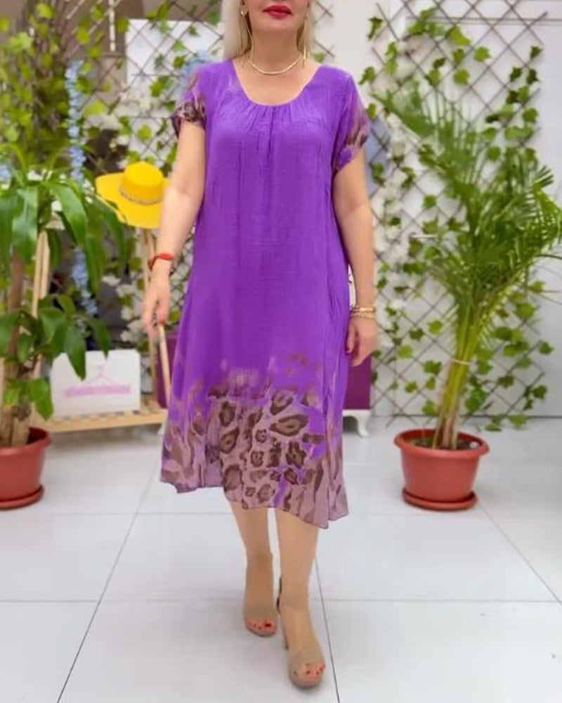 Abito casual con stampa leopardata e scollo rotondo ampio