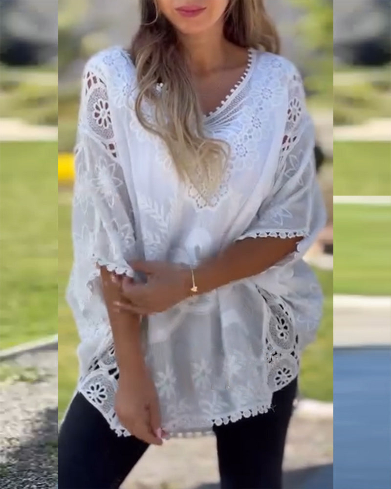 Bluse mit Spitzeneinsatz und Fledermausärmeln