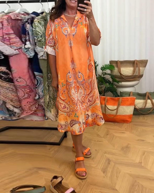 Abito con stampa retrò a revers