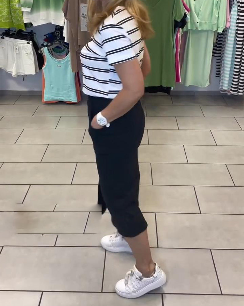 Completo gonna a righe con spacco e scollo tondo