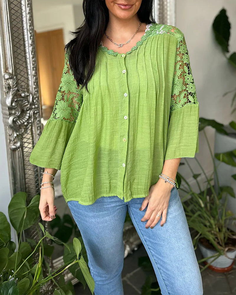 Lockere Bluse mit Spitzeneinsatz und Blumenmuster
