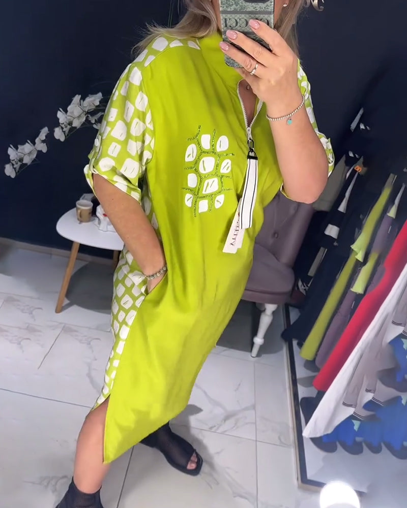 Kleid mit halbem Reißverschluss und unregelmäßigem Schlitz