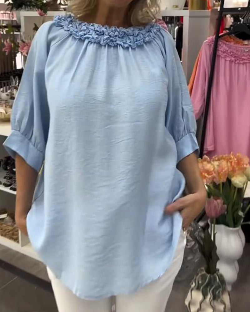 Lockere Bluse mit halblangen Ärmeln und Blumenmuster