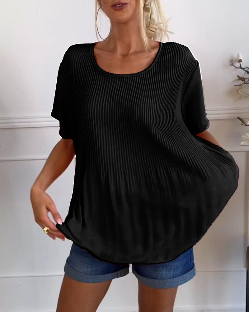 Blusa plissettata a tinta unita con scollo tondo