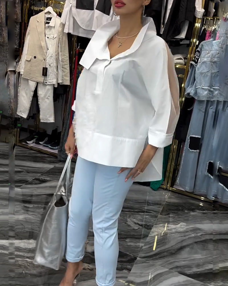 Bluse mit Blumenmuster und Spitzenbesatz am Revers