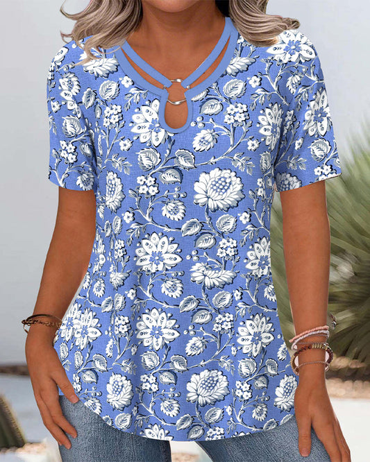 Pendlerbluse mit Rundhalsausschnitt, Blumendruck und Cut-Outs