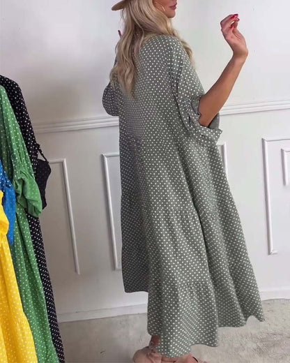 Abito a tubino a pois con mezza manica