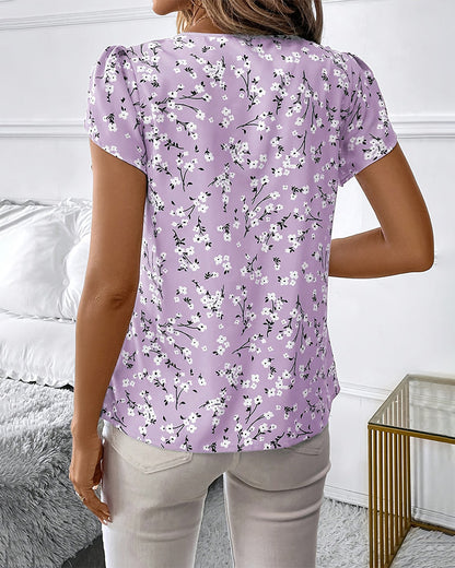 Blusen mit Blumenmuster und Rundhalsausschnitt und kurzen Ärmeln