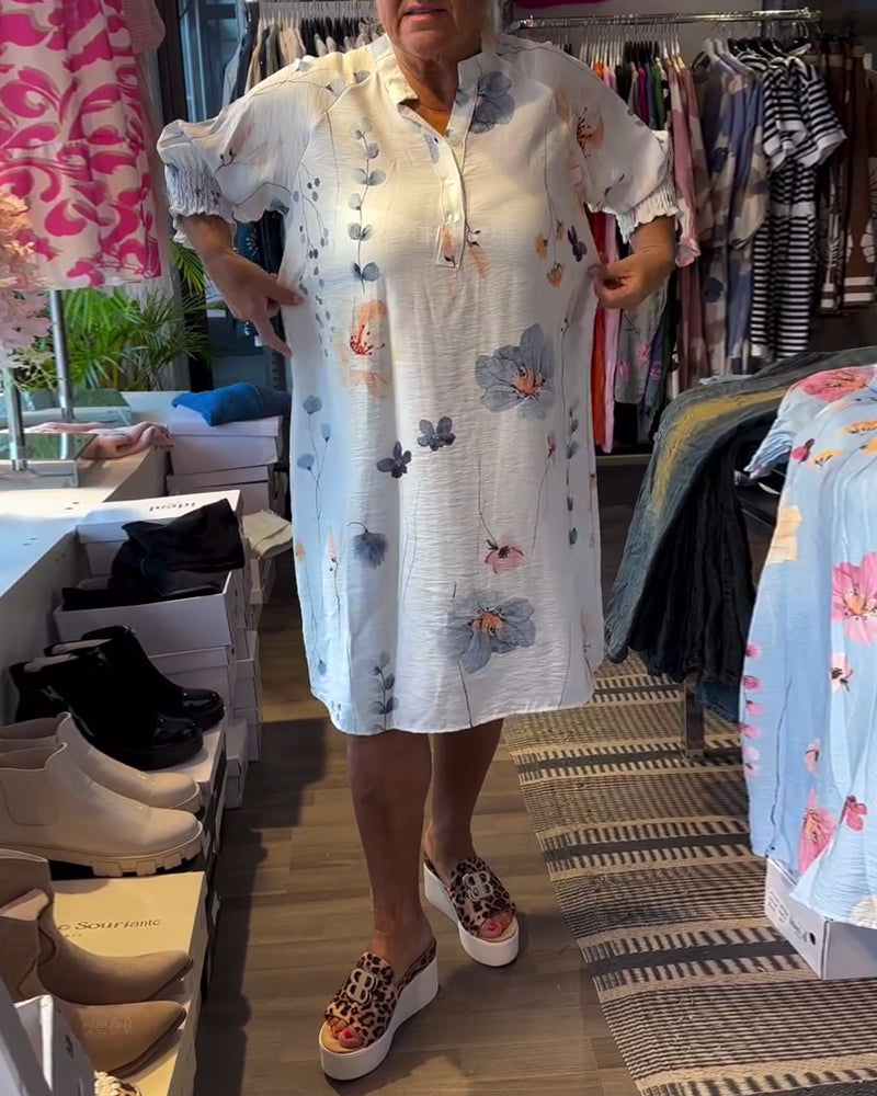 Abito a maniche corte con colletto rialzato e loto