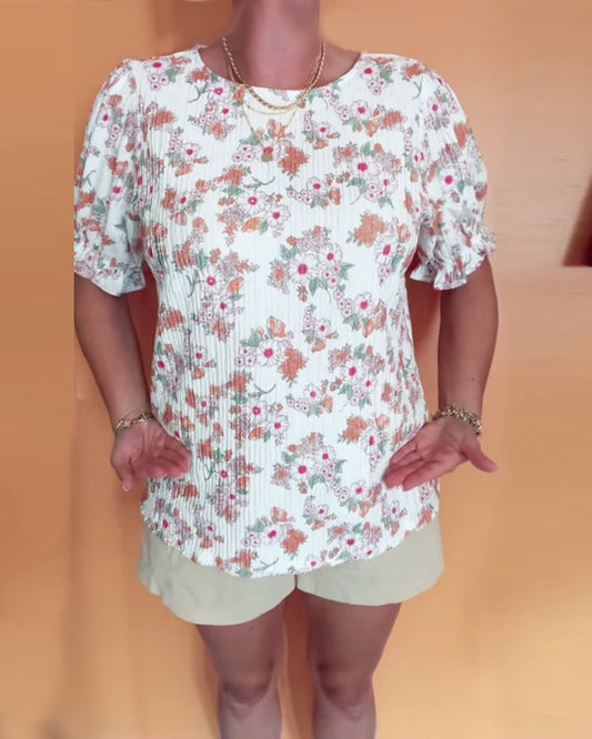 Bluse mit Rundhalsausschnitt und Blumenmuster, kurzärmlig