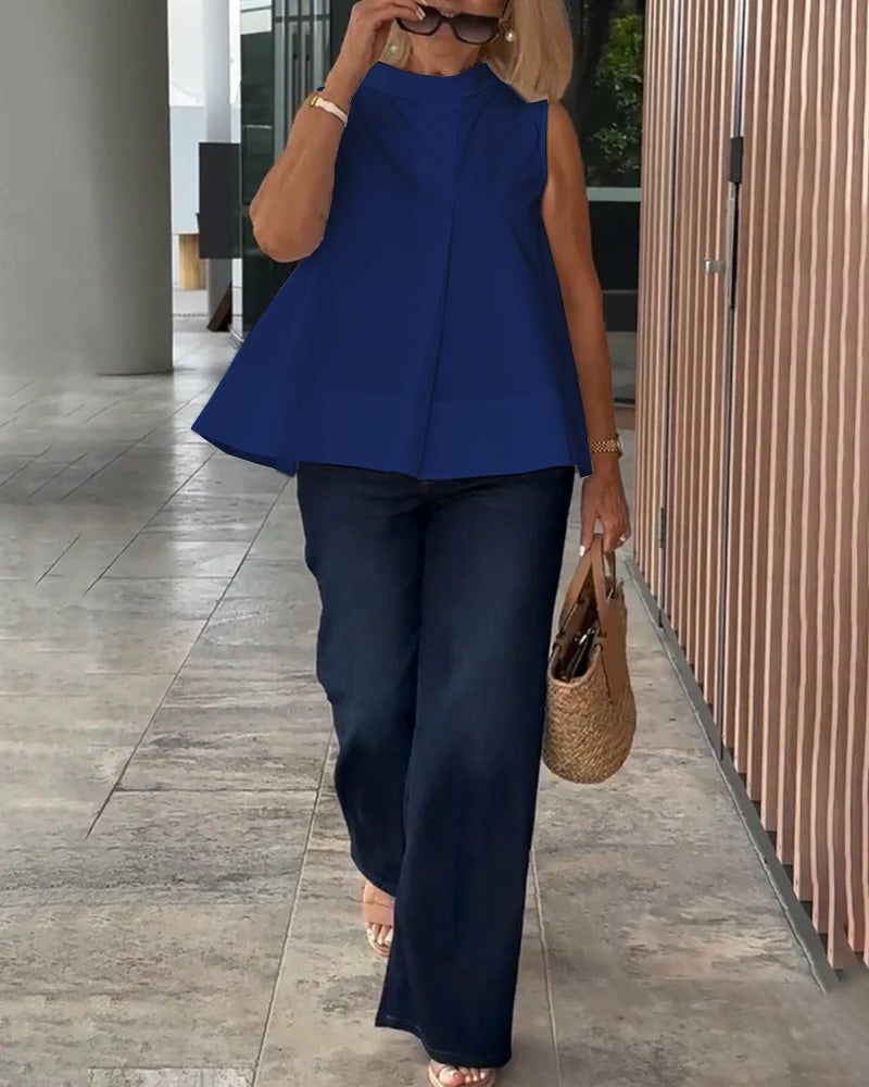 Blusa semplice senza maniche in tinta unita