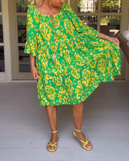 Lockeres Kleid mit Glockenärmeln und Print