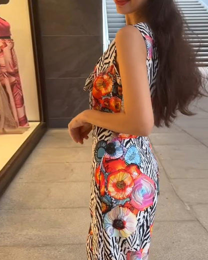 Tuta elegante senza maniche con stampa floreale