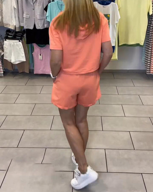 Set di pantaloncini sportivi con cappuccio tinta unita